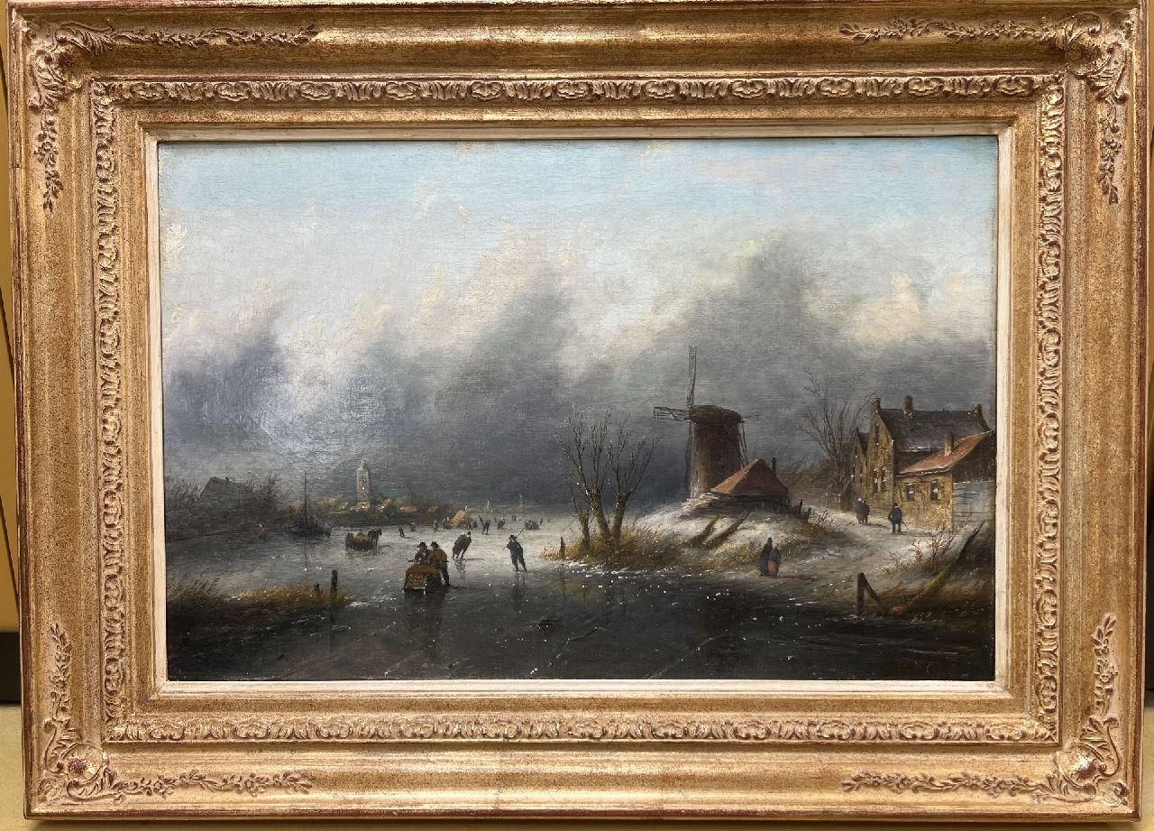 Spohler J.J.C.  | Jacob Jan Coenraad Spohler | Schilderijen te koop aangeboden | Schaatsers en sledes op het ijs bij naderende sneeuwstorm, olieverf op doek 43,8 x 67,2 cm, gesigneerd rechtsonder