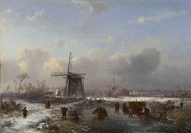 Kluyver P.L.F.  | A winterlandscape with skaters, oil on panel 32.4 x 46.0 cm, signed l.l.' Kluyver' and 'S.L.V. fig.' and painted ca. 1850-1855